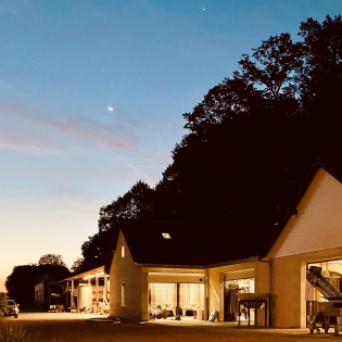 Sunrise over the winery during the wine harvest
